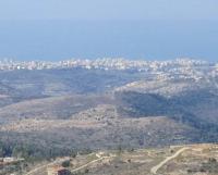 ارض 972م في روم (شرق مدينة صيدا) 